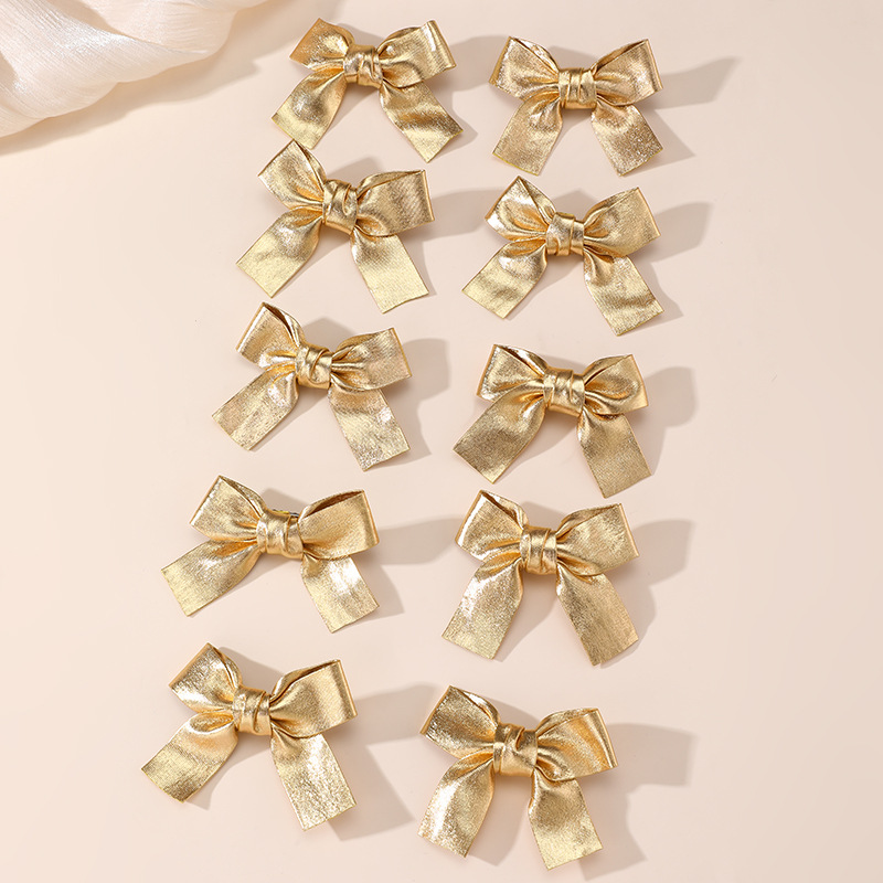 Gold and Silver Bow Hair Clips - Tie Clip Silver recensie en prijs