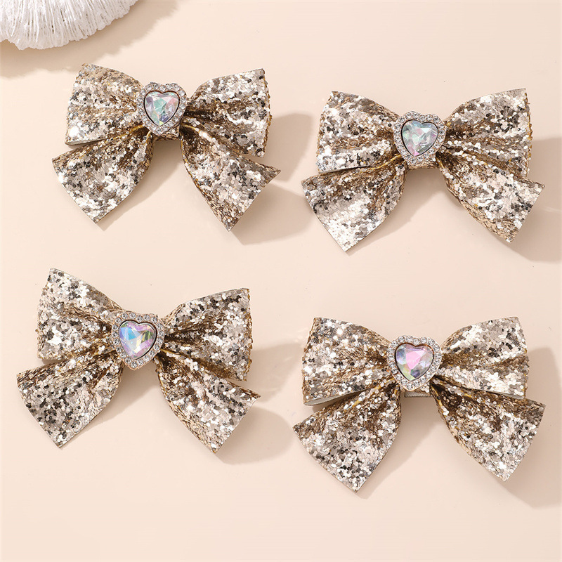 Gold and Silver Bow Hair Clips - Tie Clip Silver recensie en prijs